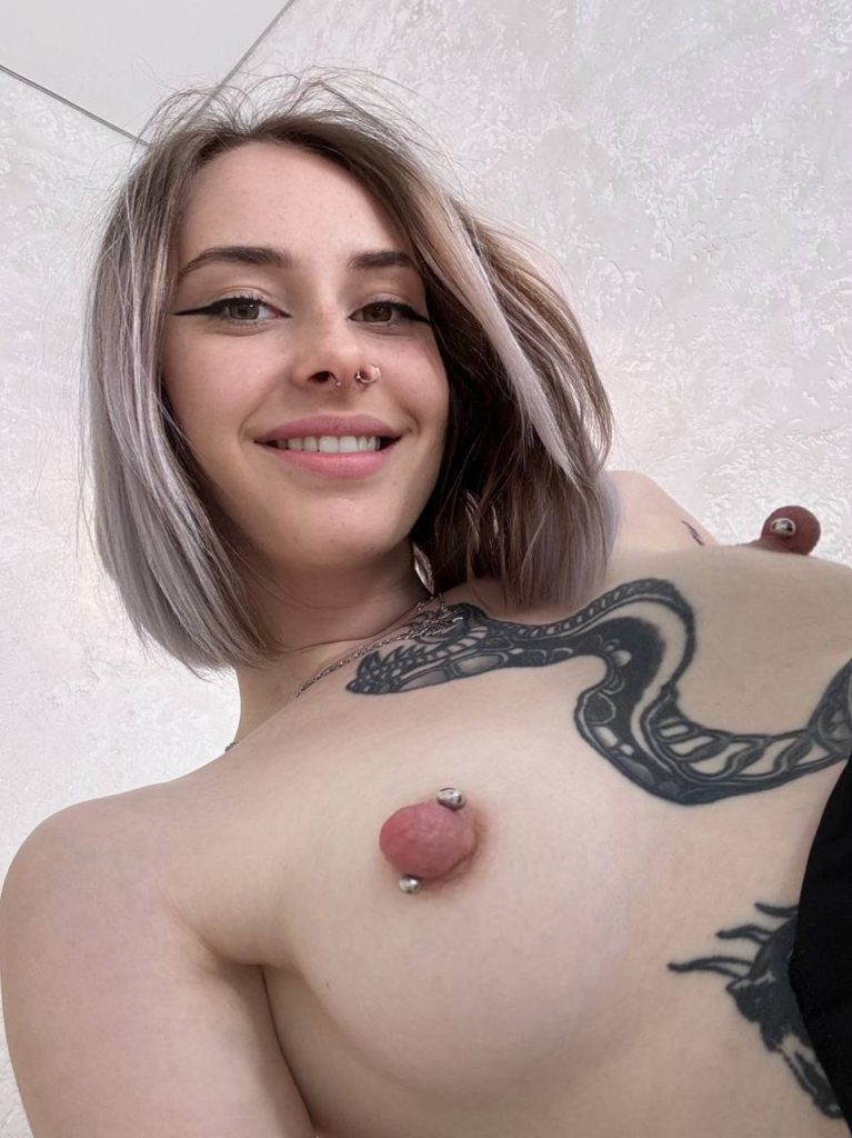 I am a woman who's as bold as the tattoos covering my petite sexy body π